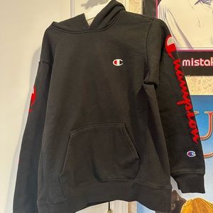 Black champion hoodie with velvet red details
